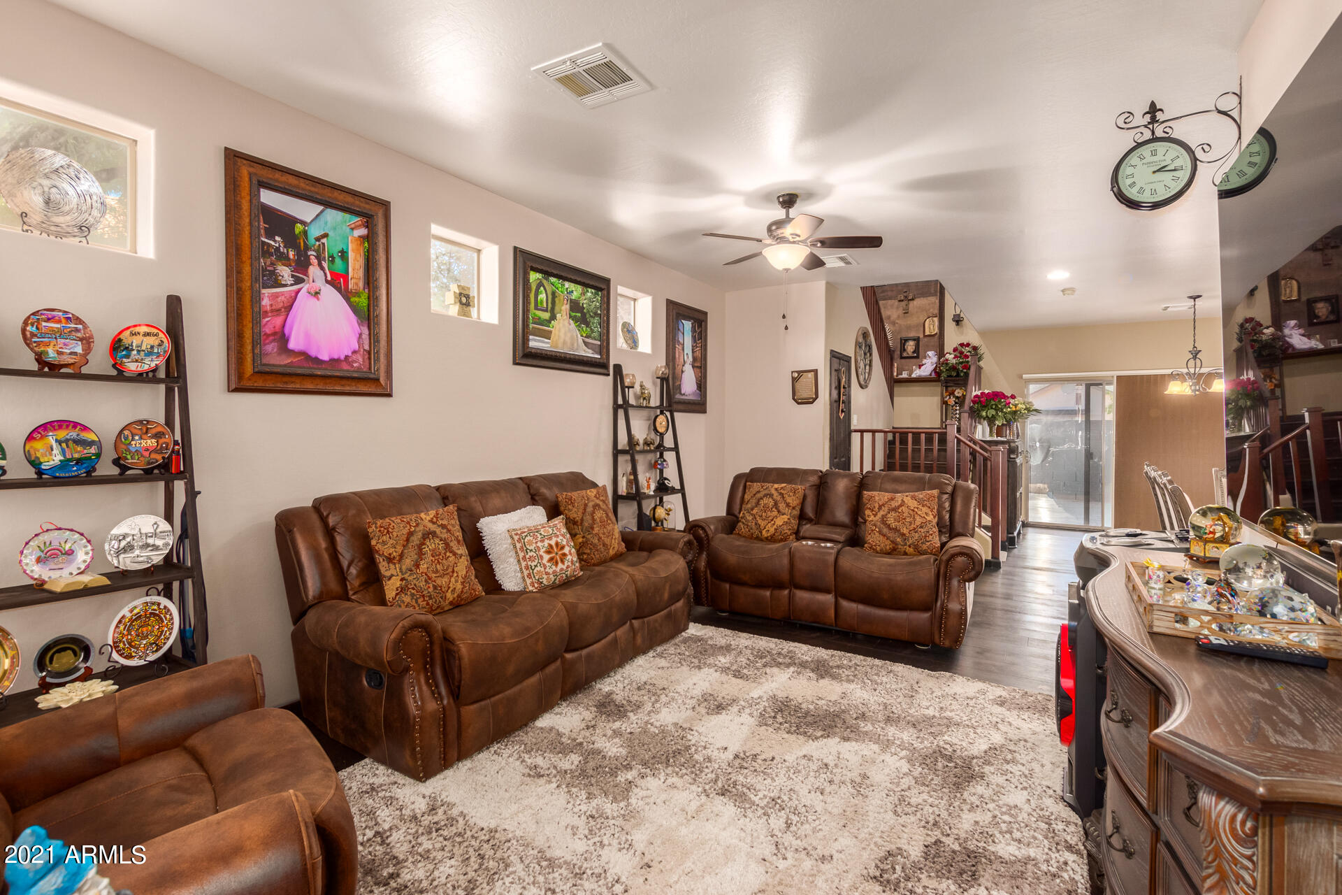 10225 West Camelback Road, Unit 8 Phoenix, AZ 85037 - Photo 4 of 30 a living room with furniture and a couch