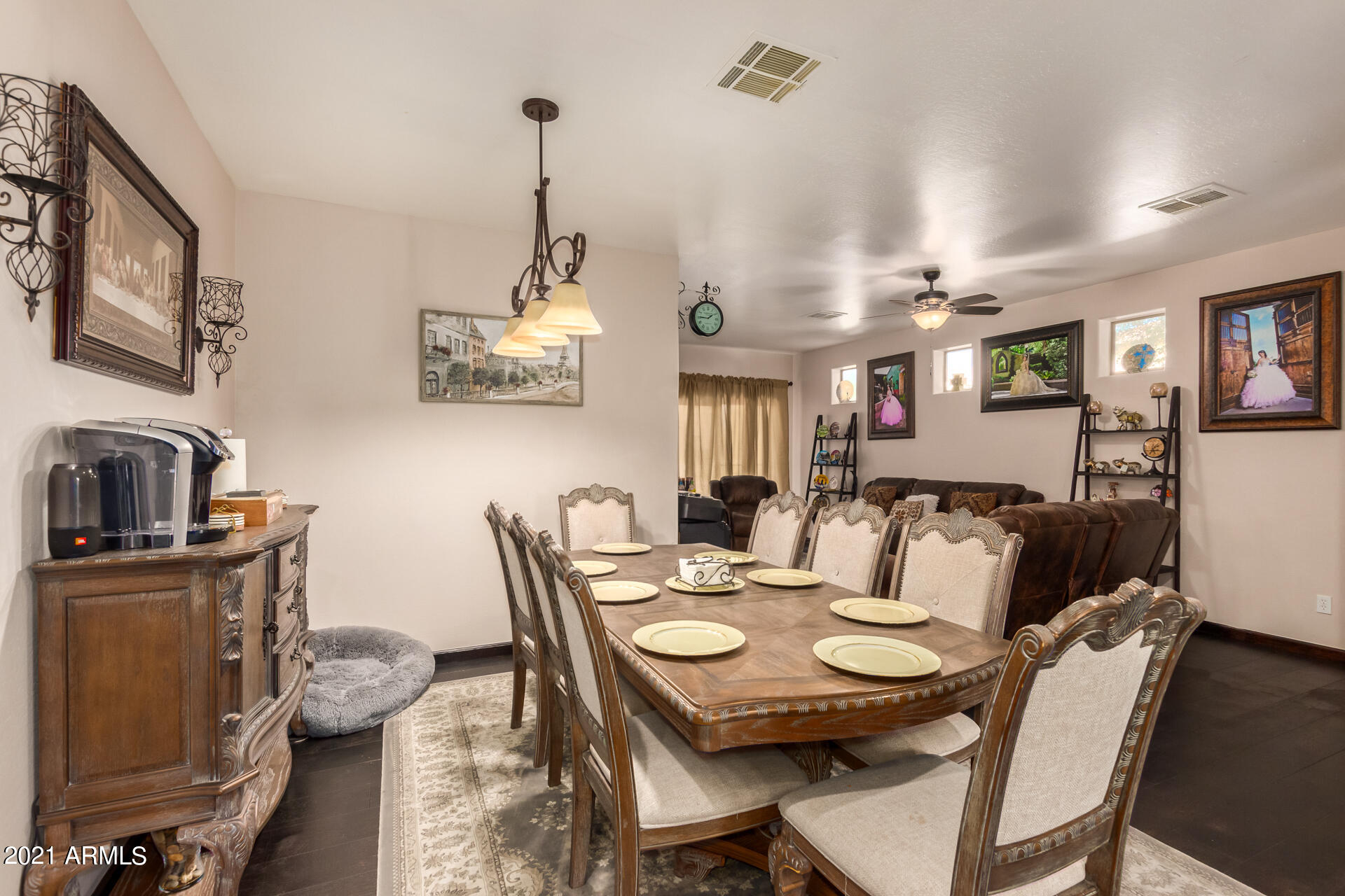 10225 West Camelback Road, Unit 8 Phoenix, AZ 85037 - Photo 8 of 30 a view of a dining room with furniture
