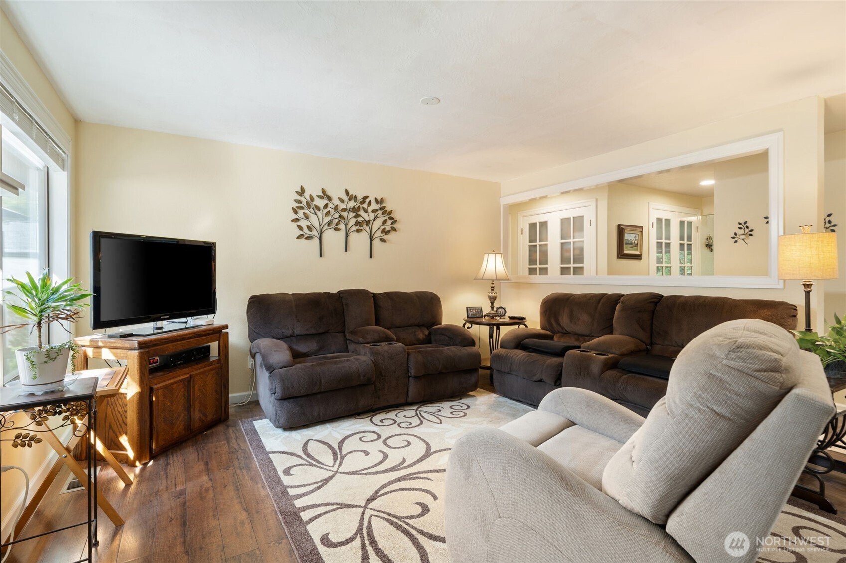 383 Kirner Road Sequim, WA 98382 - Photo 15 of 40 a living room with furniture and a flat screen tv