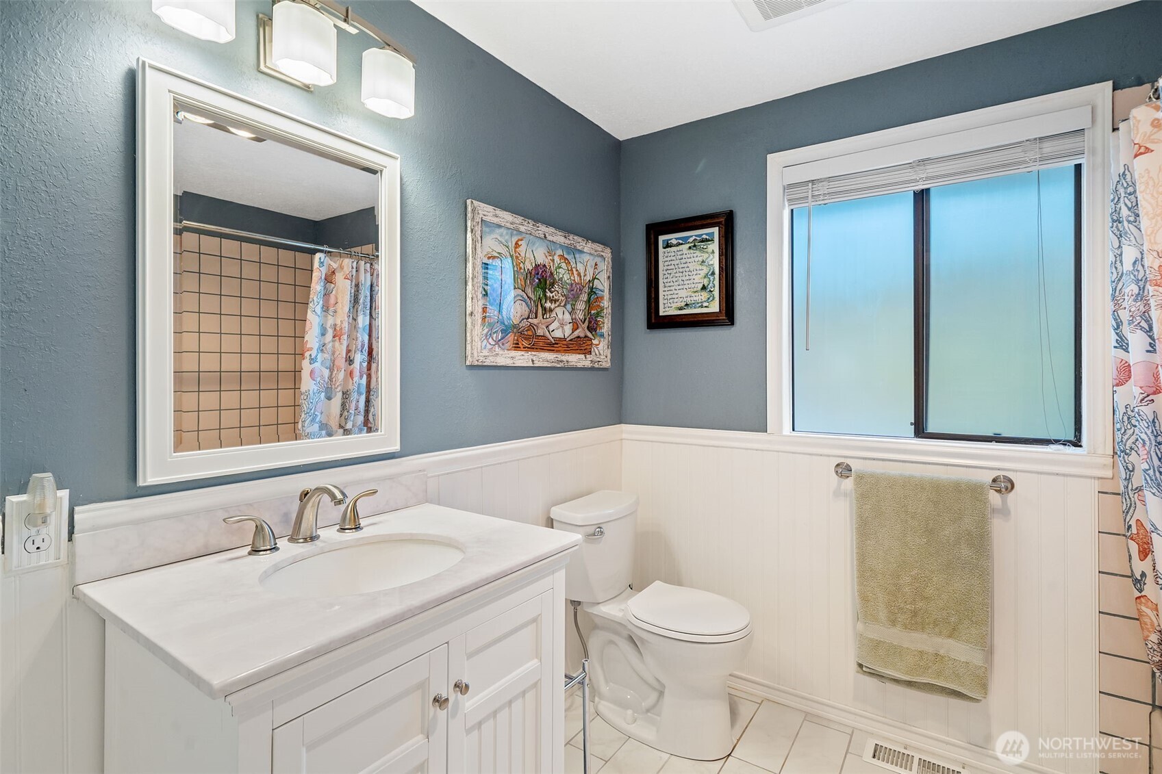 383 Kirner Road Sequim, WA 98382 - Photo 22 of 40 a bathroom with a sink vanity granite toilet and a mirror