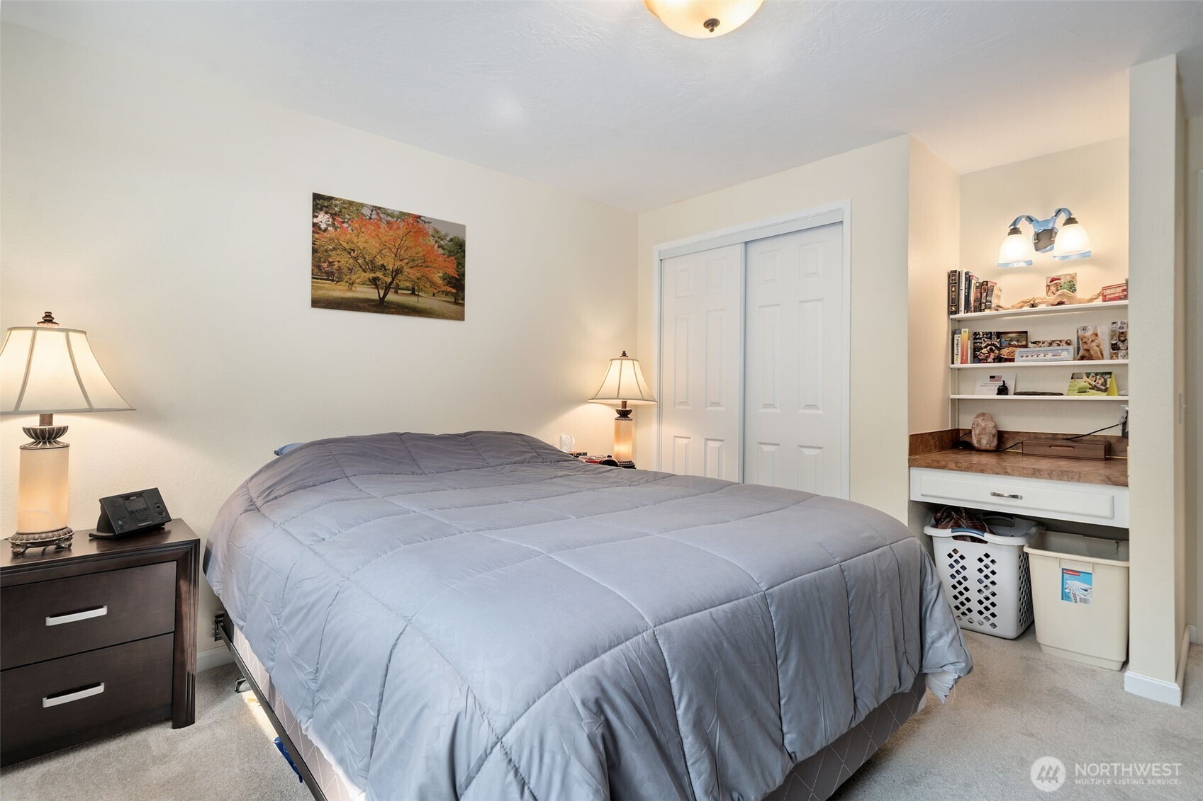 383 Kirner Road Sequim, WA 98382 - Photo 25 of 40 a bedroom with a bed and a cabinets