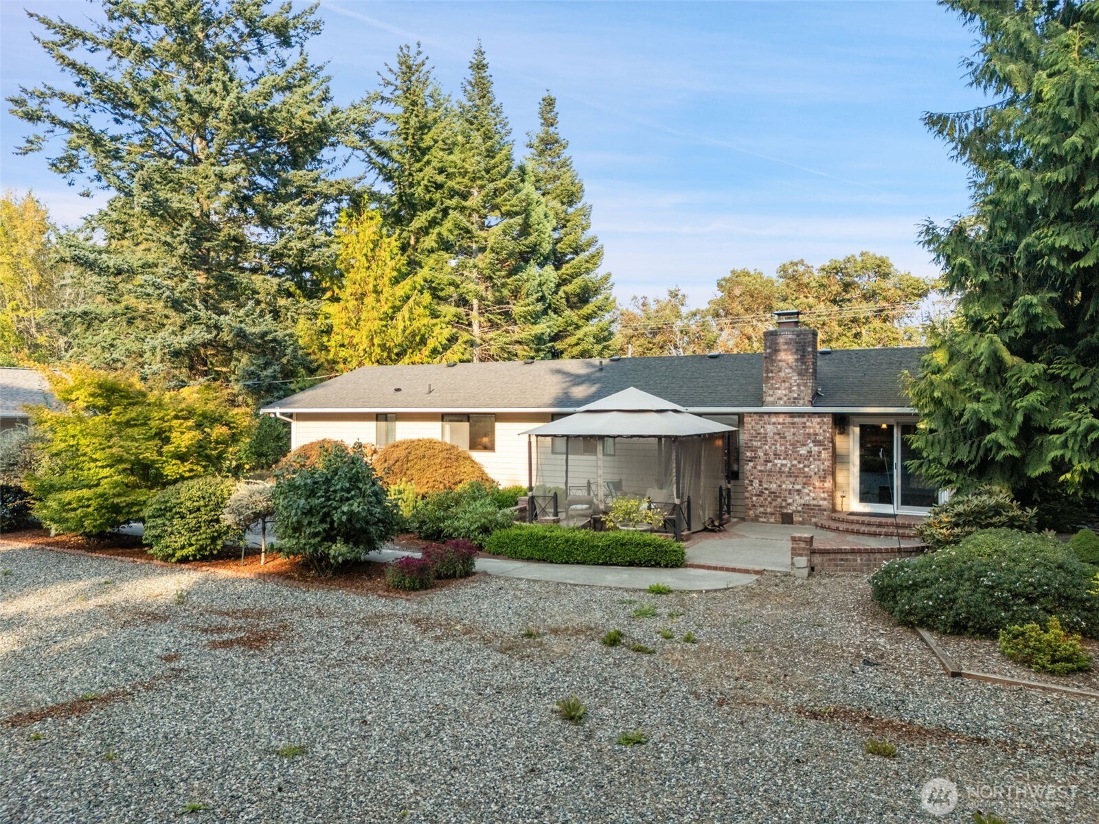 383 Kirner Road Sequim, WA 98382 - Photo 30 of 40 a front view of a house with a yard