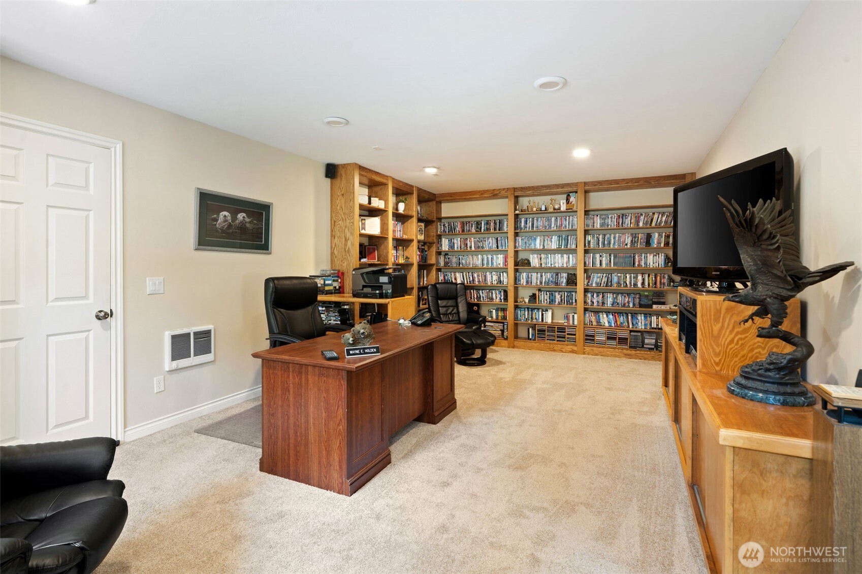 383 Kirner Road Sequim, WA 98382 - Photo 34 of 40 a living room with furniture and a flat screen tv