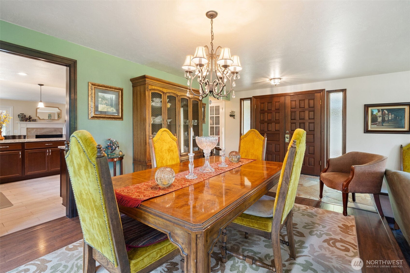 383 Kirner Road Sequim, WA 98382 - Photo 7 of 40 a view of a dining room with furniture and chandelier