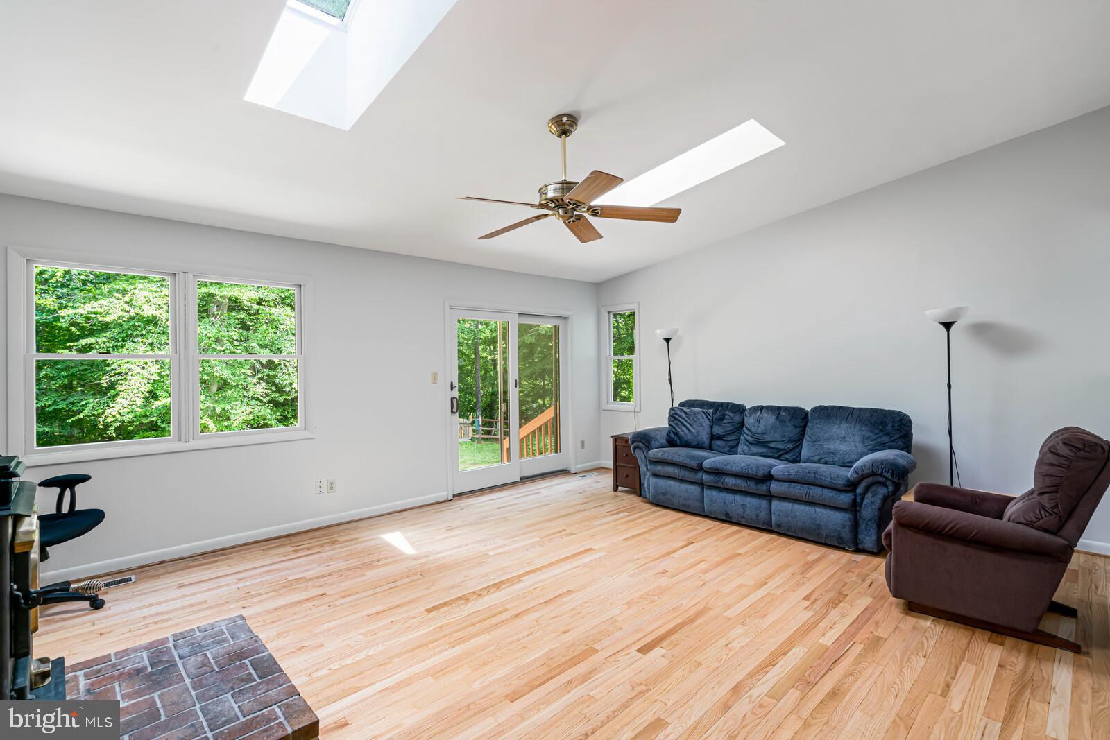 7120 Hadlow Court Springfield, VA 22152 - Photo 23 of 41 Skylights, CF, SGD to yard in Fam Rm