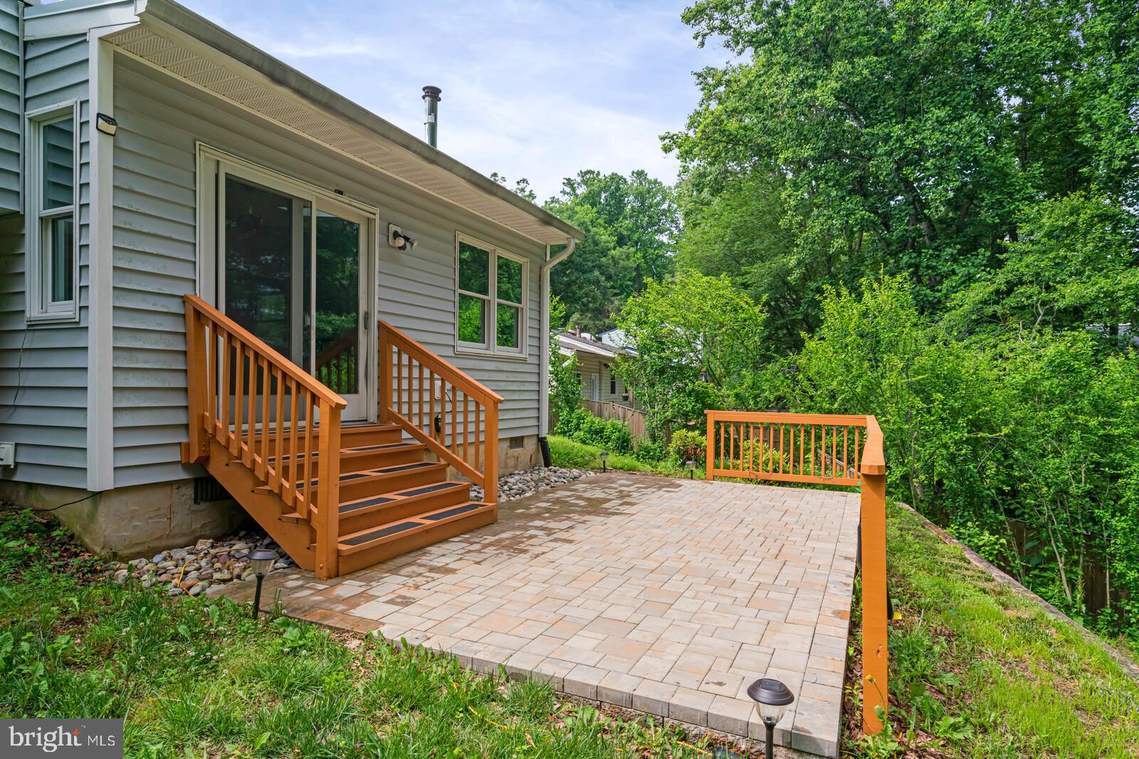 7120 Hadlow Court Springfield, VA 22152 - Photo 24 of 41 Newer steps, patio, fence