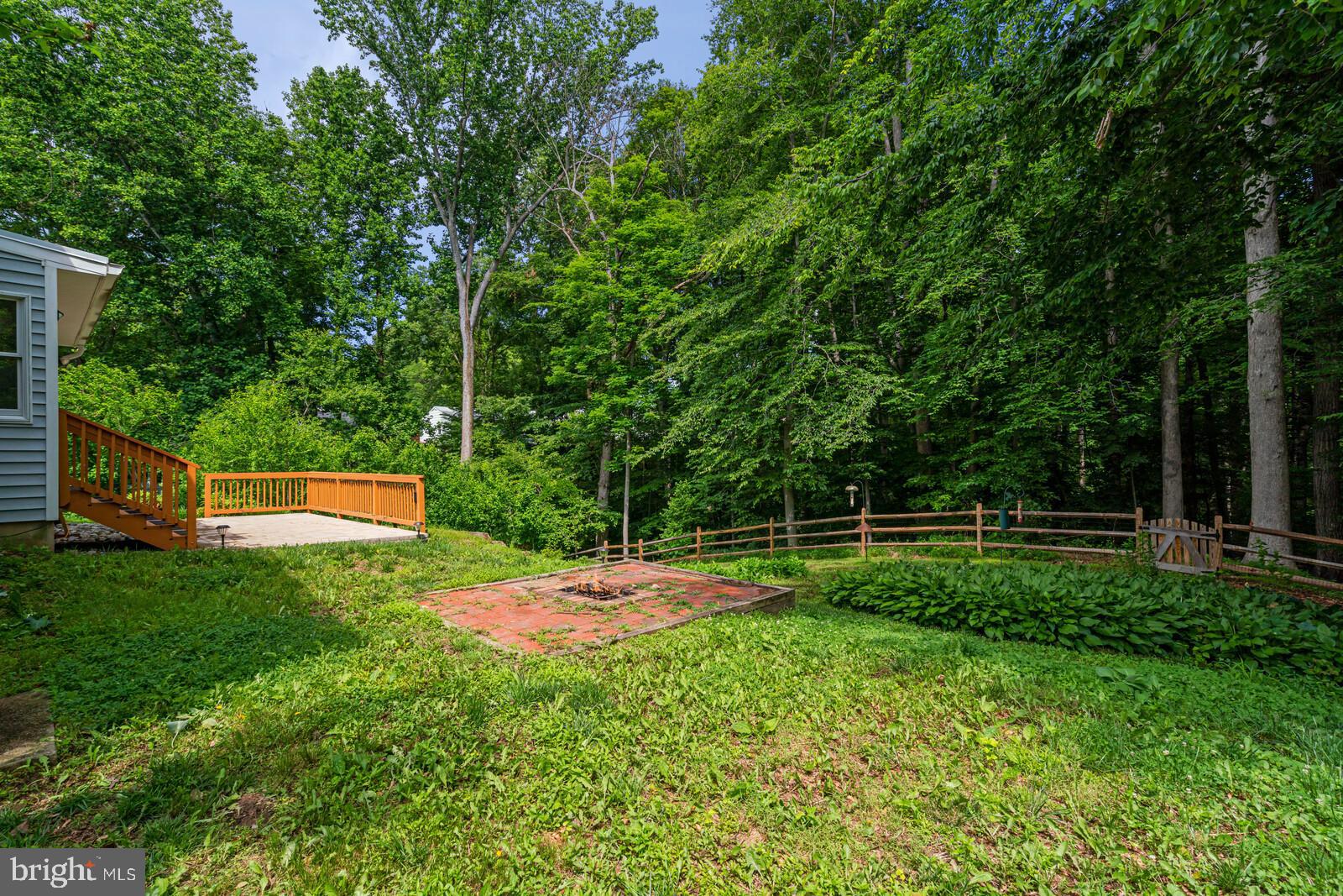 7120 Hadlow Court Springfield, VA 22152 - Photo 27 of 41 Paved firepit and patio in fenced yard
