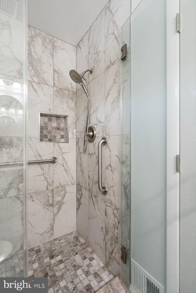 7120 Hadlow Court Springfield, VA 22152 - Photo 32 of 41 Primary seamless standing shower