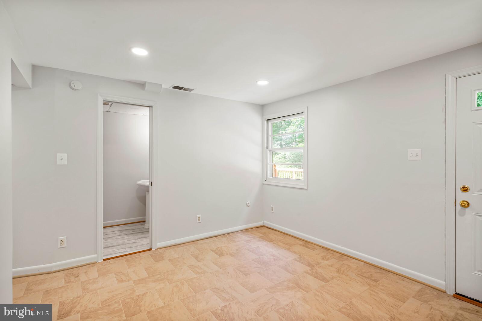 7120 Hadlow Court Springfield, VA 22152 - Photo 9 of 41 Half bath & storage off Den