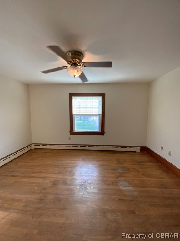 14 Light Street Heathsville, VA 22473 - Photo 12 of 18 Unfurnished room with hardwood / wood-style floors and ceiling fan