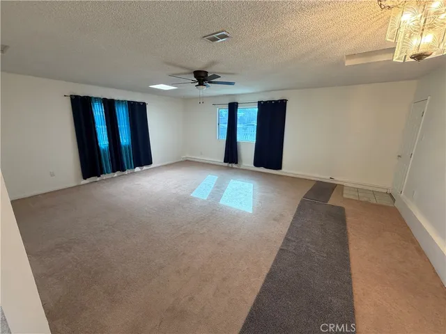 a bathroom with a toilet sink and shower