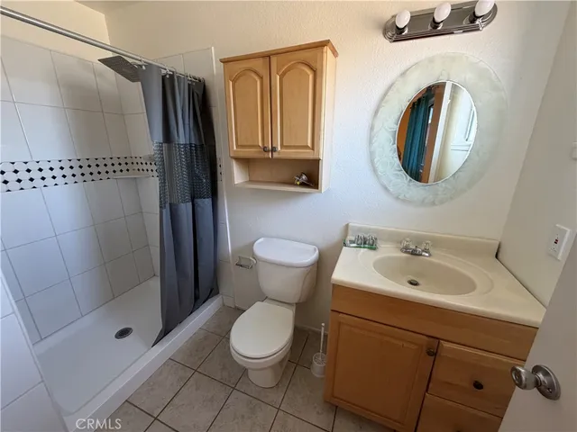 a view of a hallway with a chandelier