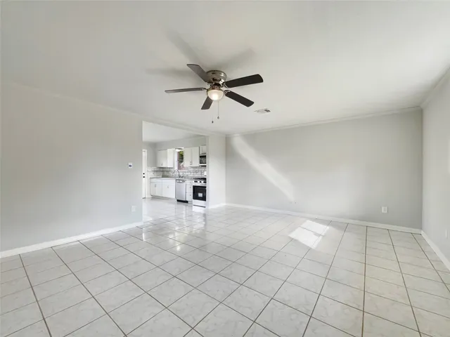 a view of an empty room and window