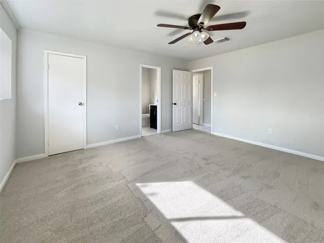 a view of a ceiling fan in a room