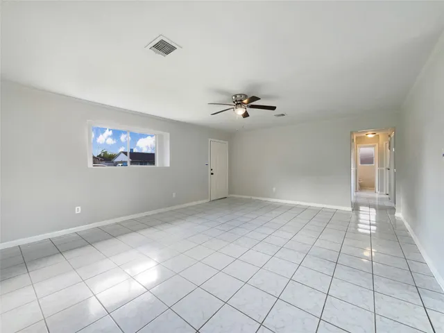 a view of an empty room and window