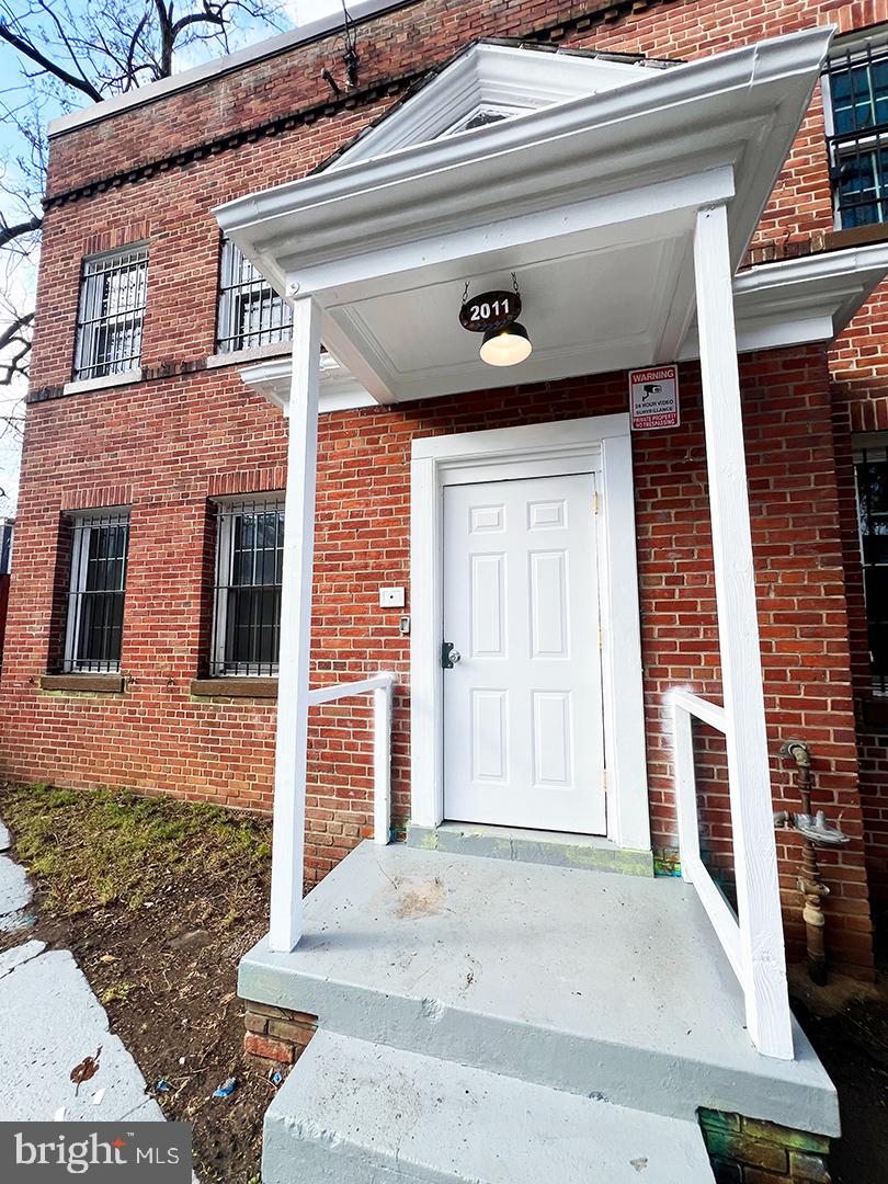 2011 16th Street Southeast Washington, DC 20020 - Photo 2 of 19 a front view of a house with garage