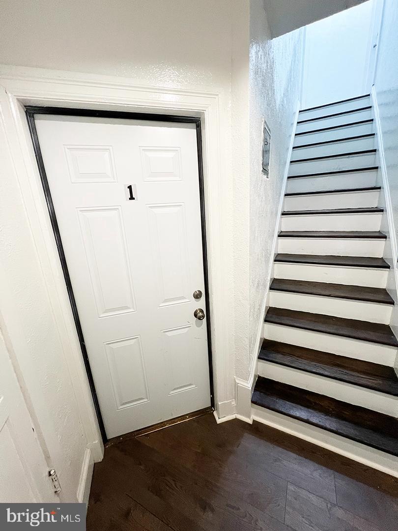 2011 16th Street Southeast Washington, DC 20020 - Photo 10 of 19 a view of entryway with stairs and wooden floor