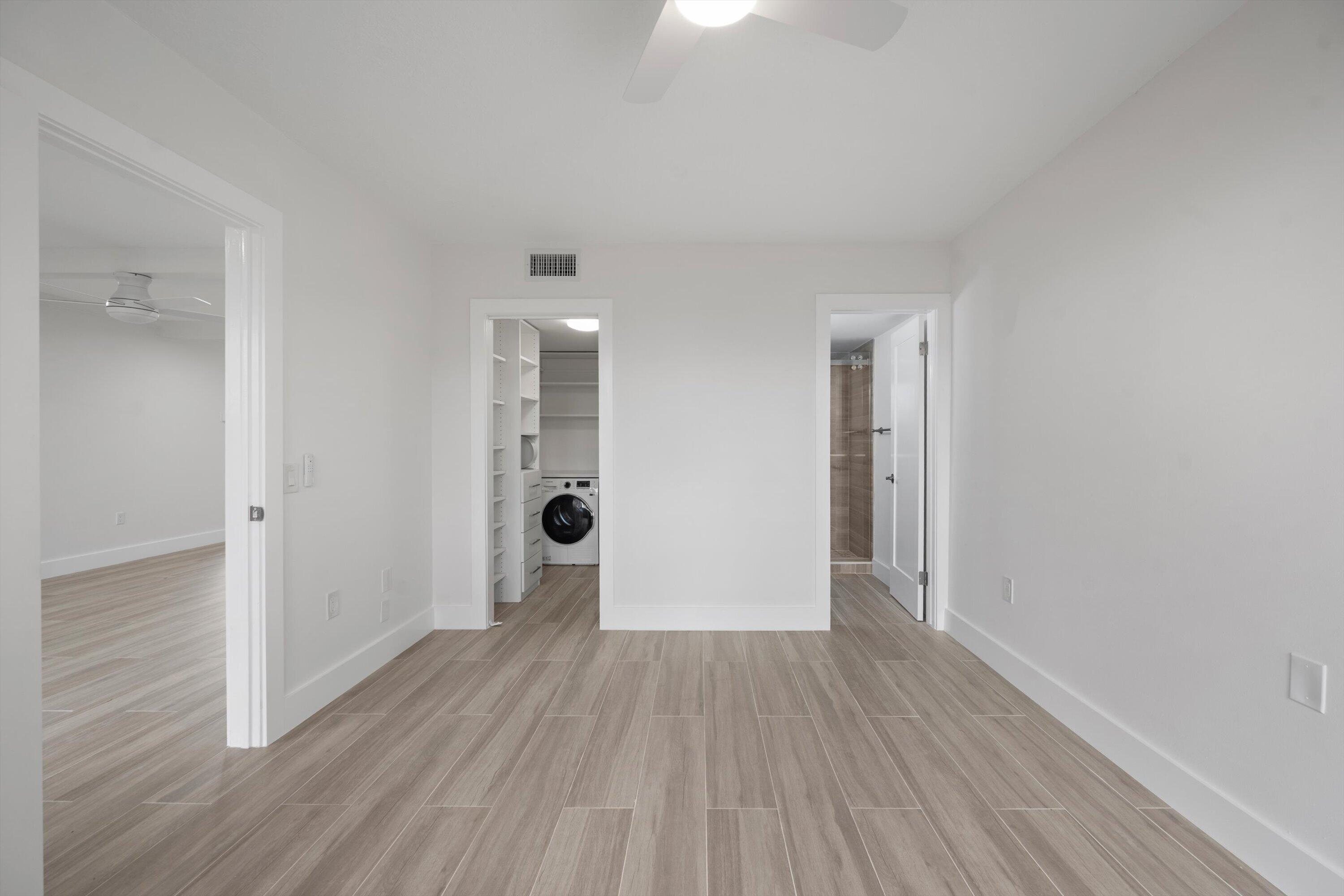225 South Beach Road, Unit 102 Jupiter, FL 33469 - Photo 13 of 22 a view of empty room with wooden floor