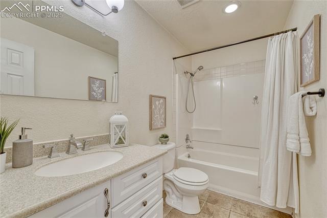 26 Mountain View Road Manitou Springs, CO 80829 - Photo 32 of 48 Upper level full bathroom with tile floors and solid surface vanity
