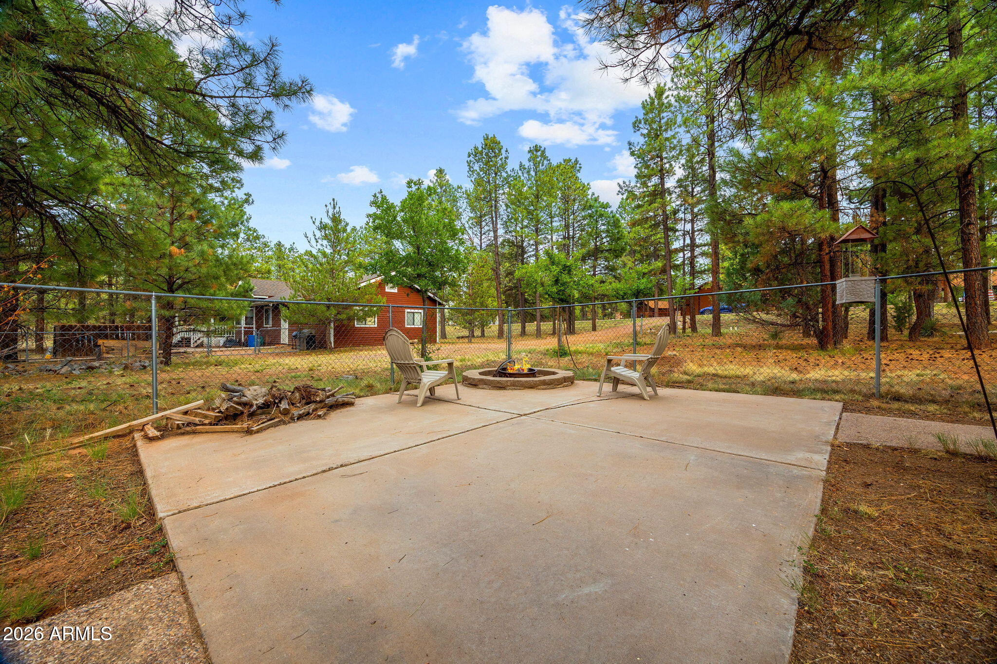 2236 Cross Country Road Overgaard, AZ 85933 - Photo 44 of 59 a view of a patio with a tree