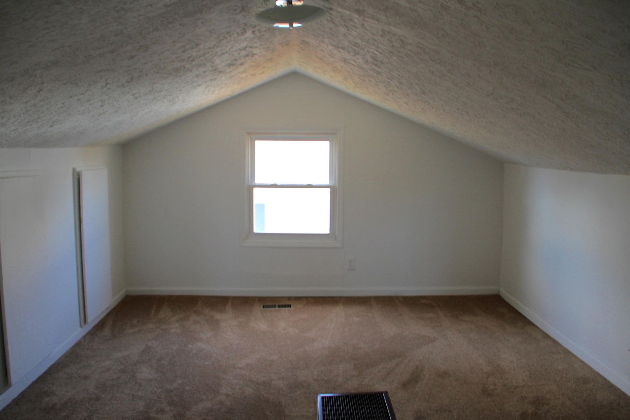 1295 Zion Ridge Road Loudon, TN 37774 - Photo 24 of 40 an empty room with a window