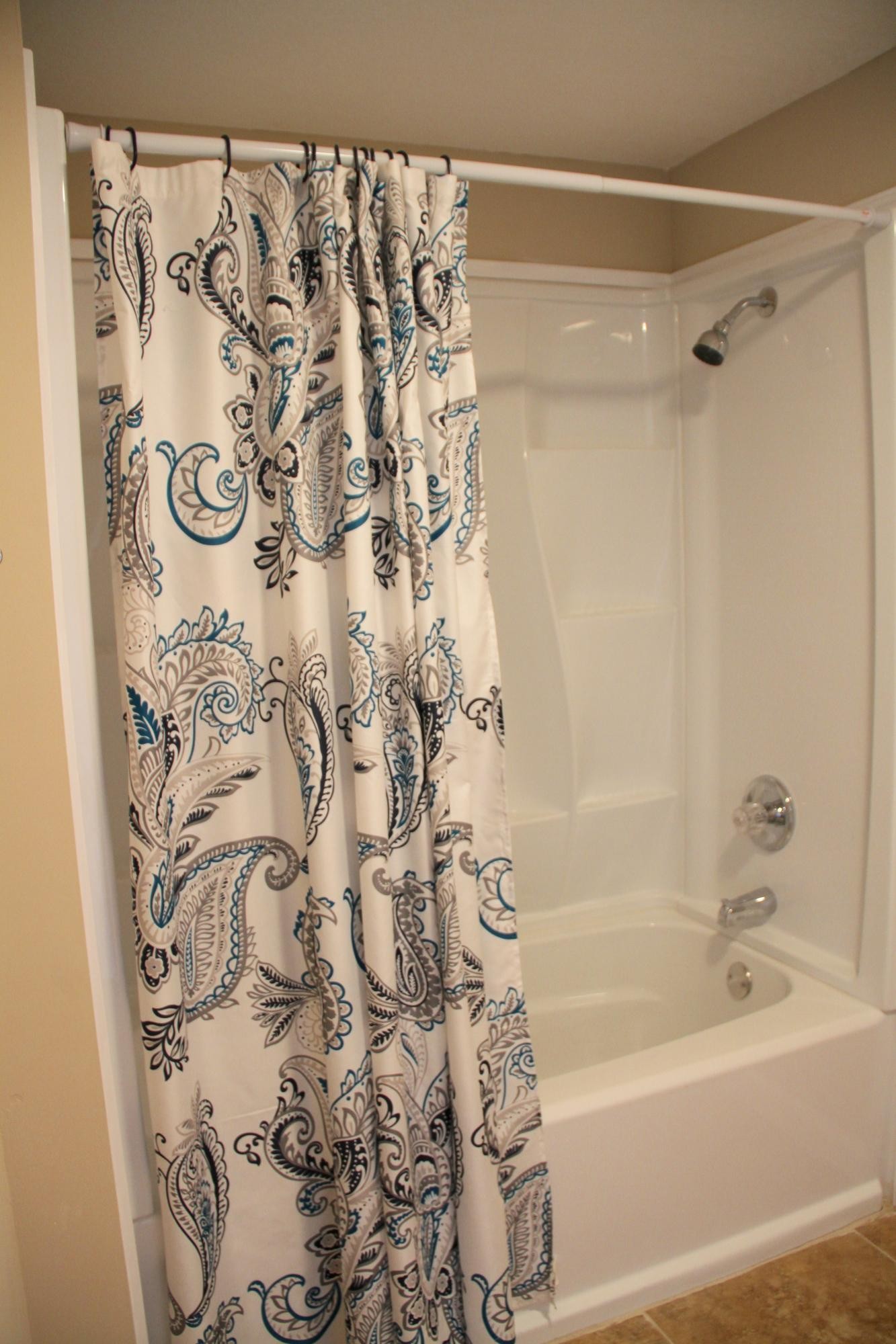 1295 Zion Ridge Road Loudon, TN 37774 - Photo 28 of 40 a bathroom with a bathtub and shower