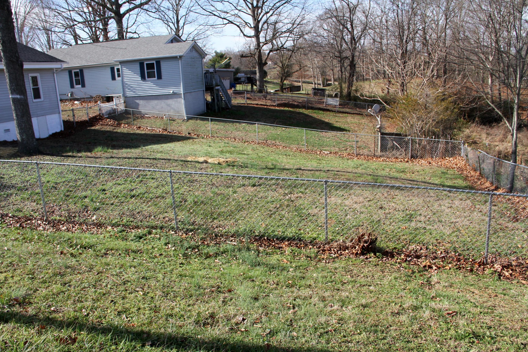 1295 Zion Ridge Road Loudon, TN 37774 - Photo 32 of 40 a view of a yard with a house and a yard