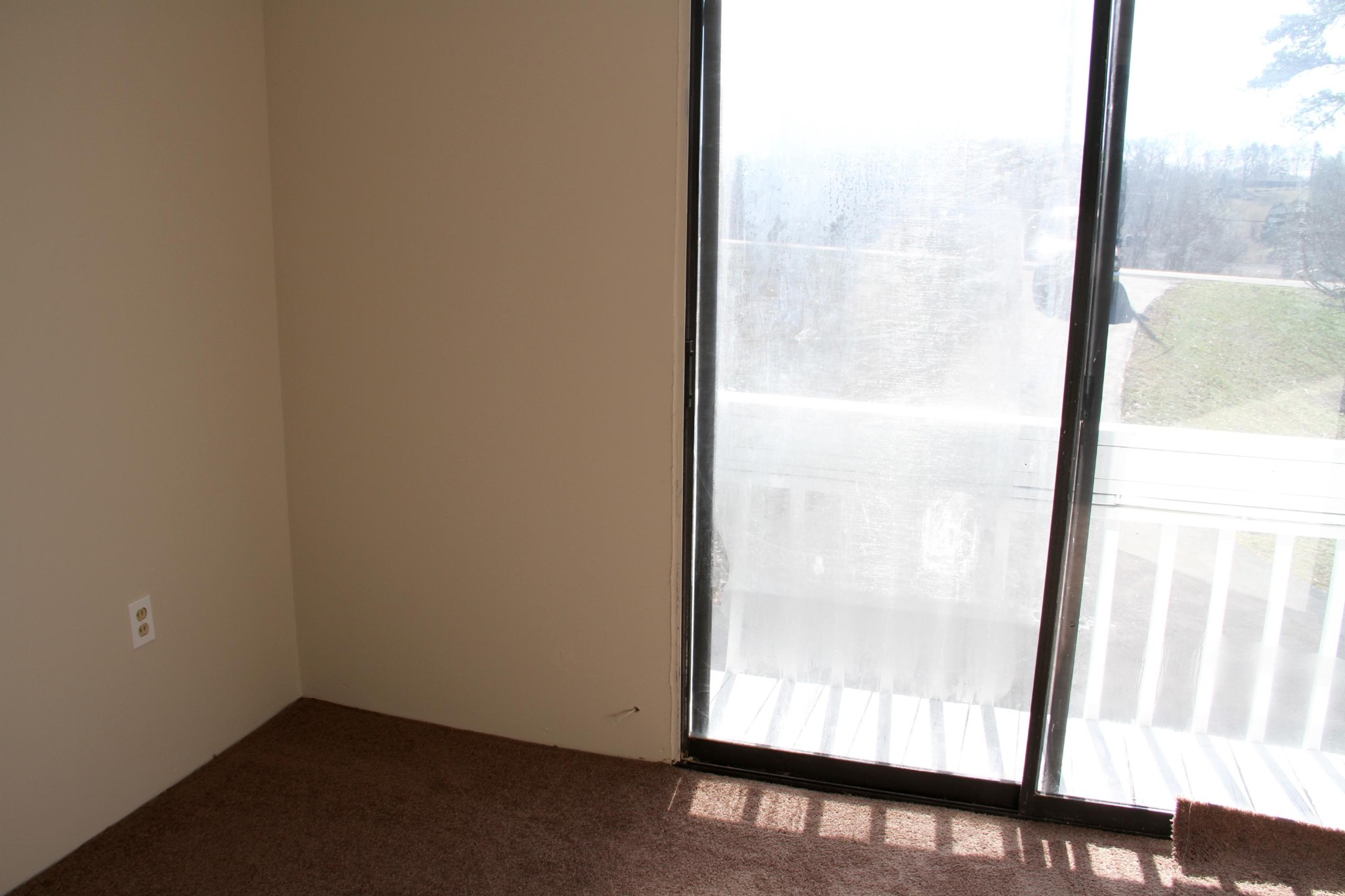 1295 Zion Ridge Road Loudon, TN 37774 - Photo 36 of 40 an empty room with wooden floor and a window