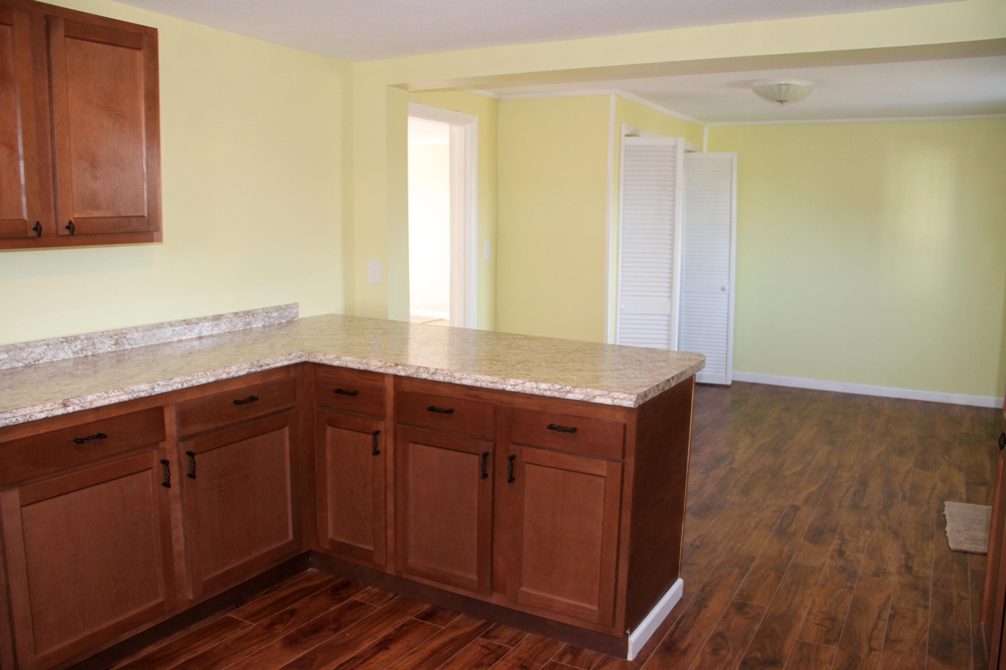 1295 Zion Ridge Road Loudon, TN 37774 - Photo 6 of 40 a room with wooden cabinets and a sink