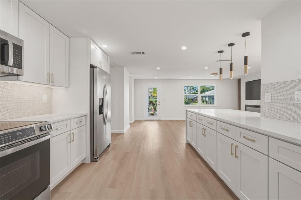 1330 Horizon Road Venice, FL 34293 - Photo 14 of 40 a view of a kitchen with electric appliances