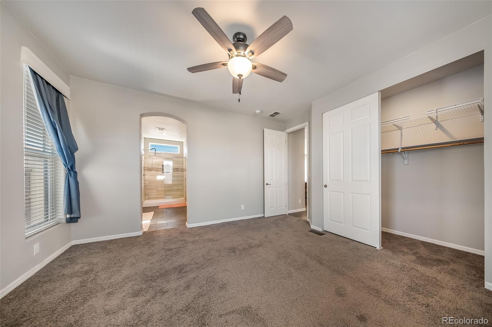551 Summit Trail Granby, CO 80446 - Photo 14 of 35 a view of an empty room with a window