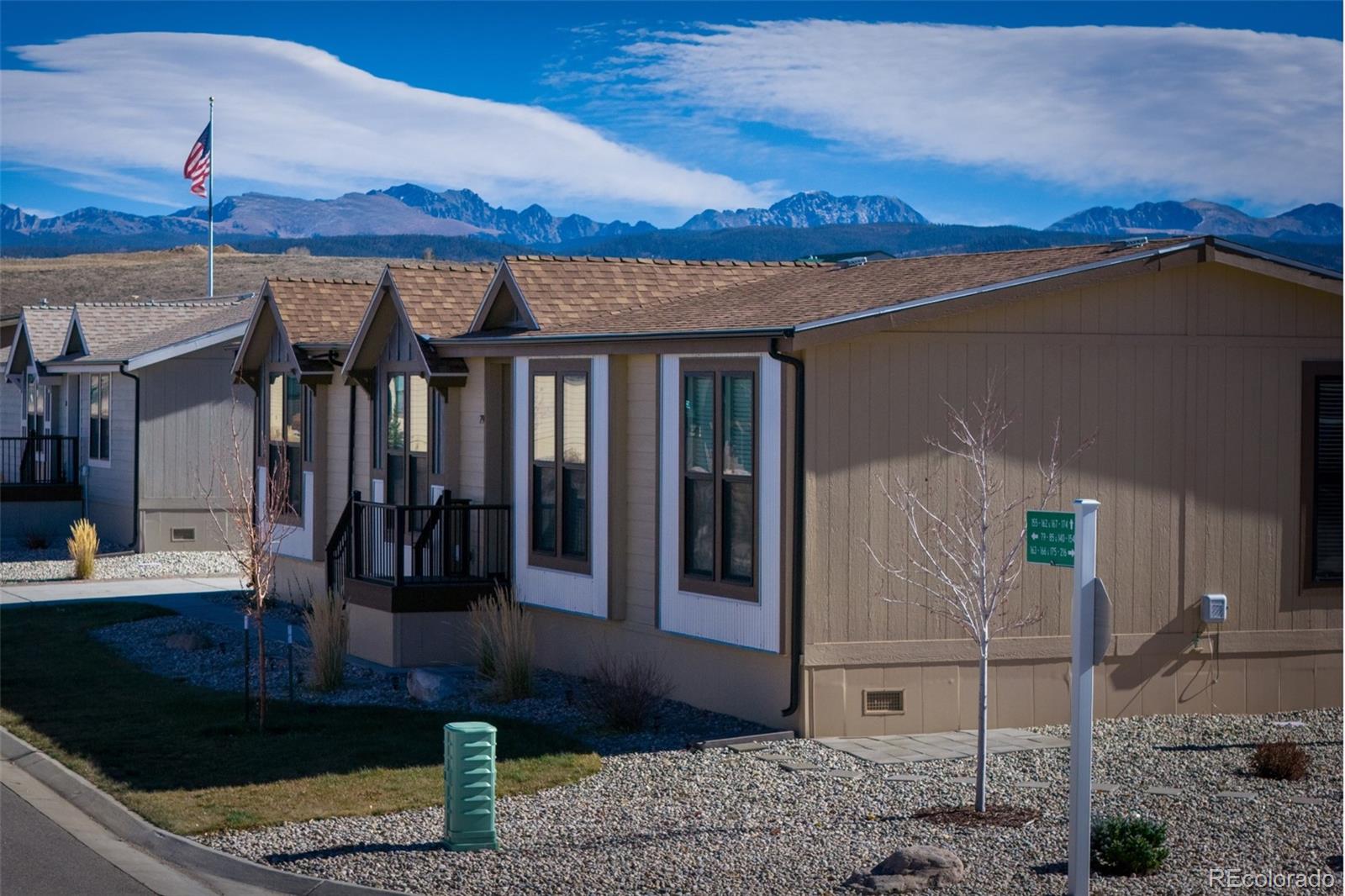 551 Summit Trail Granby, CO 80446 - Photo 32 of 35 a front view of a house with garden