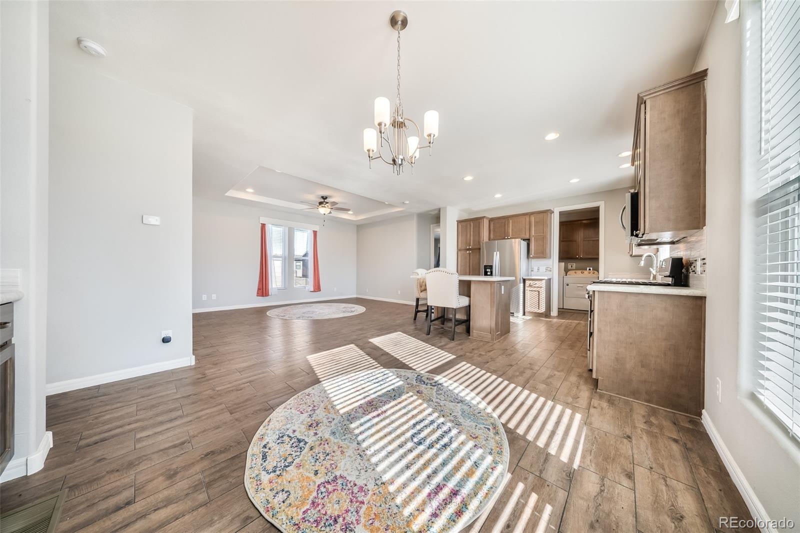 551 Summit Trail Granby, CO 80446 - Photo 10 of 35 a view of a livingroom with furniture wooden floor and a window