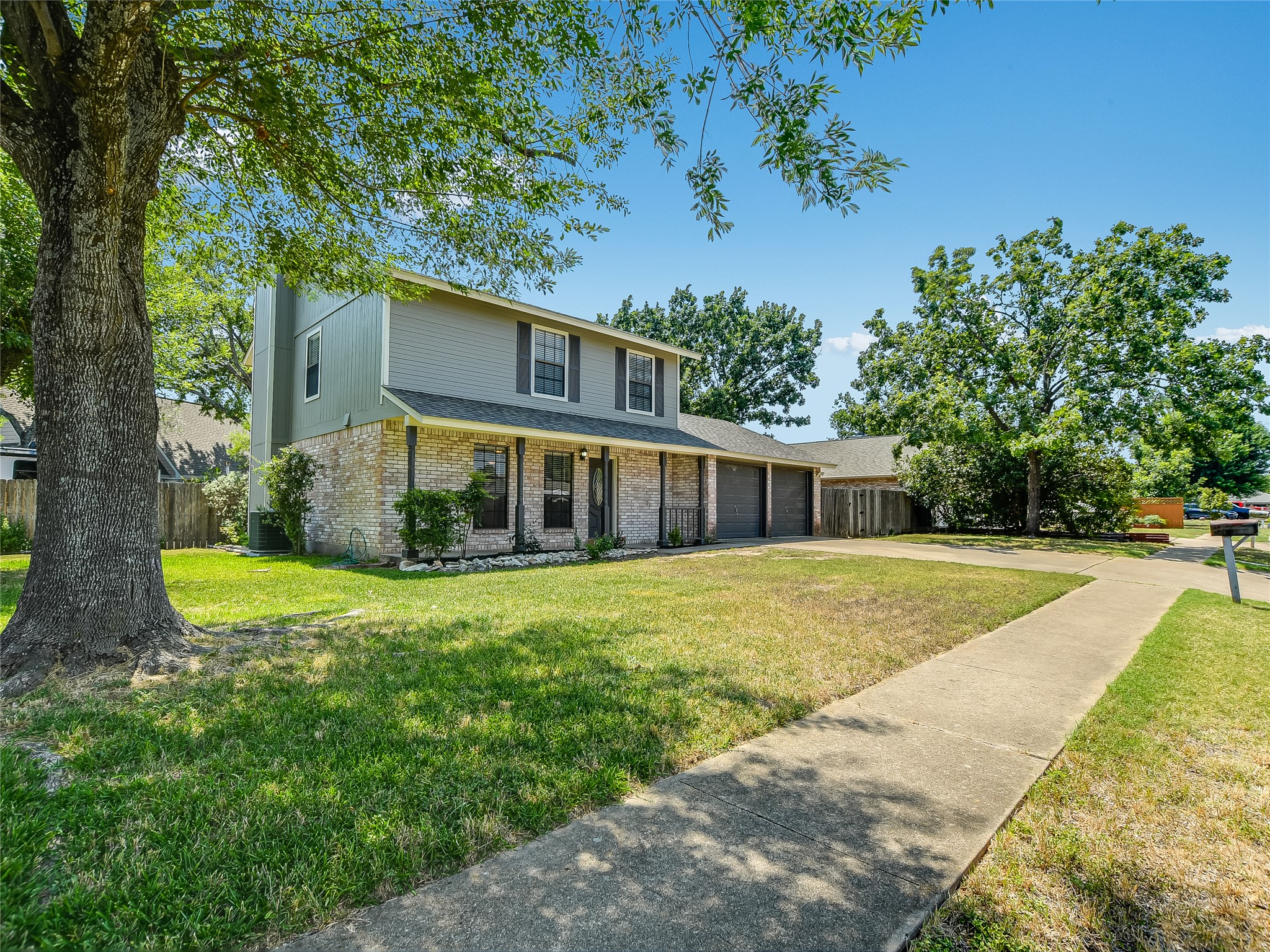 300 North Field Street Round Rock, TX 78681 - Photo 1 of 26 Large corner lot with additional side yard parking.