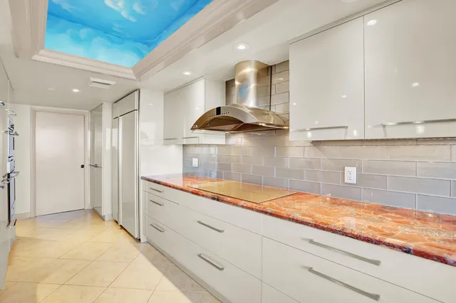 a view of a chair and table in the balcony