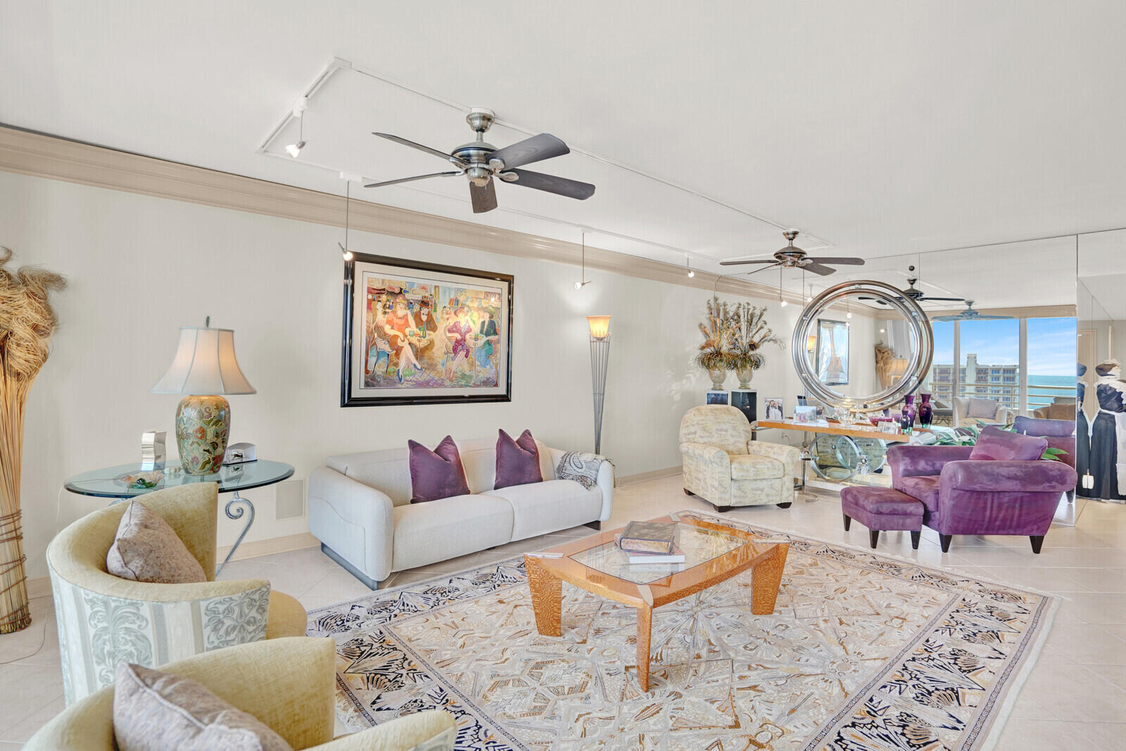 4201 North Ocean Boulevard, Unit PH1806 Boca Raton, FL 33431 - Photo 20 of 47 a living room with furniture a rug and white walls