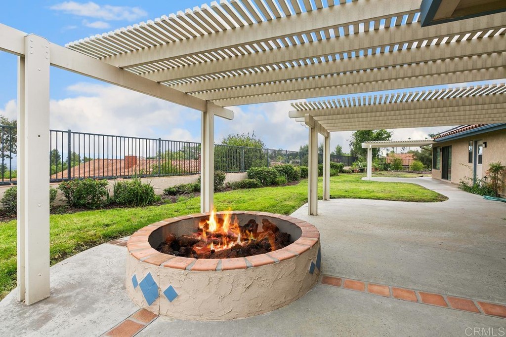 2248 Winsome Place Escondido, CA 92029 - Photo 14 of 26 a view of a house with a swimming pool
