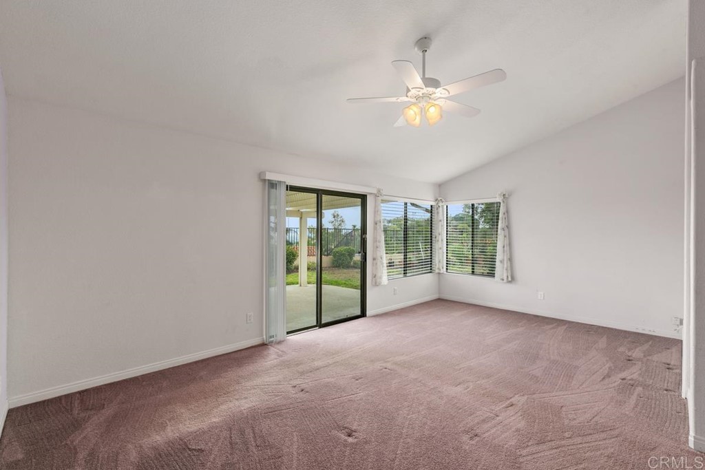 2248 Winsome Place Escondido, CA 92029 - Photo 17 of 26 a view of a livingroom with a ceiling fan and window