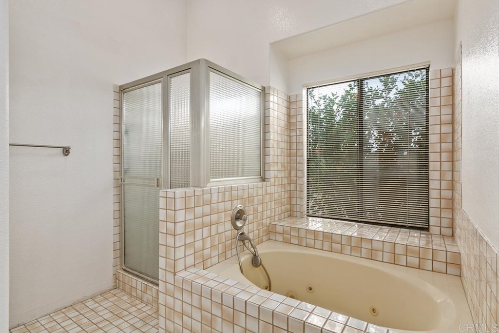 2248 Winsome Place Escondido, CA 92029 - Photo 20 of 26 a bathroom with a bathtub and shower