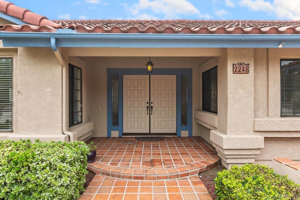 2248 Winsome Place Escondido, CA 92029 - Photo 3 of 26 a view of a entryway door of the house