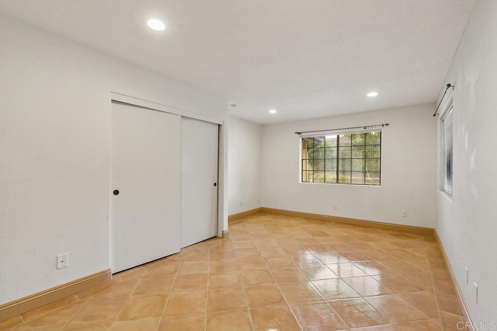 2248 Winsome Place Escondido, CA 92029 - Photo 21 of 26 a view of an empty room with a window