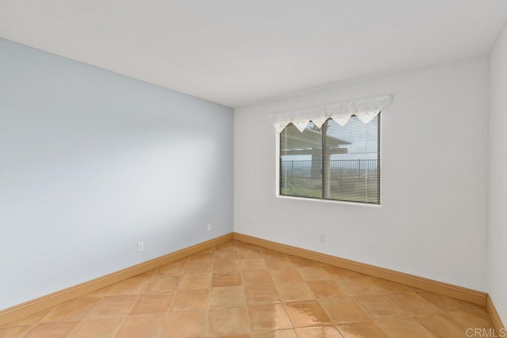 2248 Winsome Place Escondido, CA 92029 - Photo 24 of 26 an empty room with windows