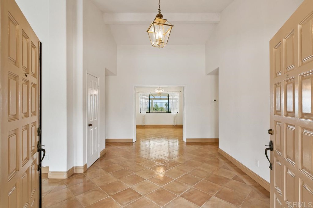 2248 Winsome Place Escondido, CA 92029 - Photo 4 of 26 a view of an entryway with chandelier