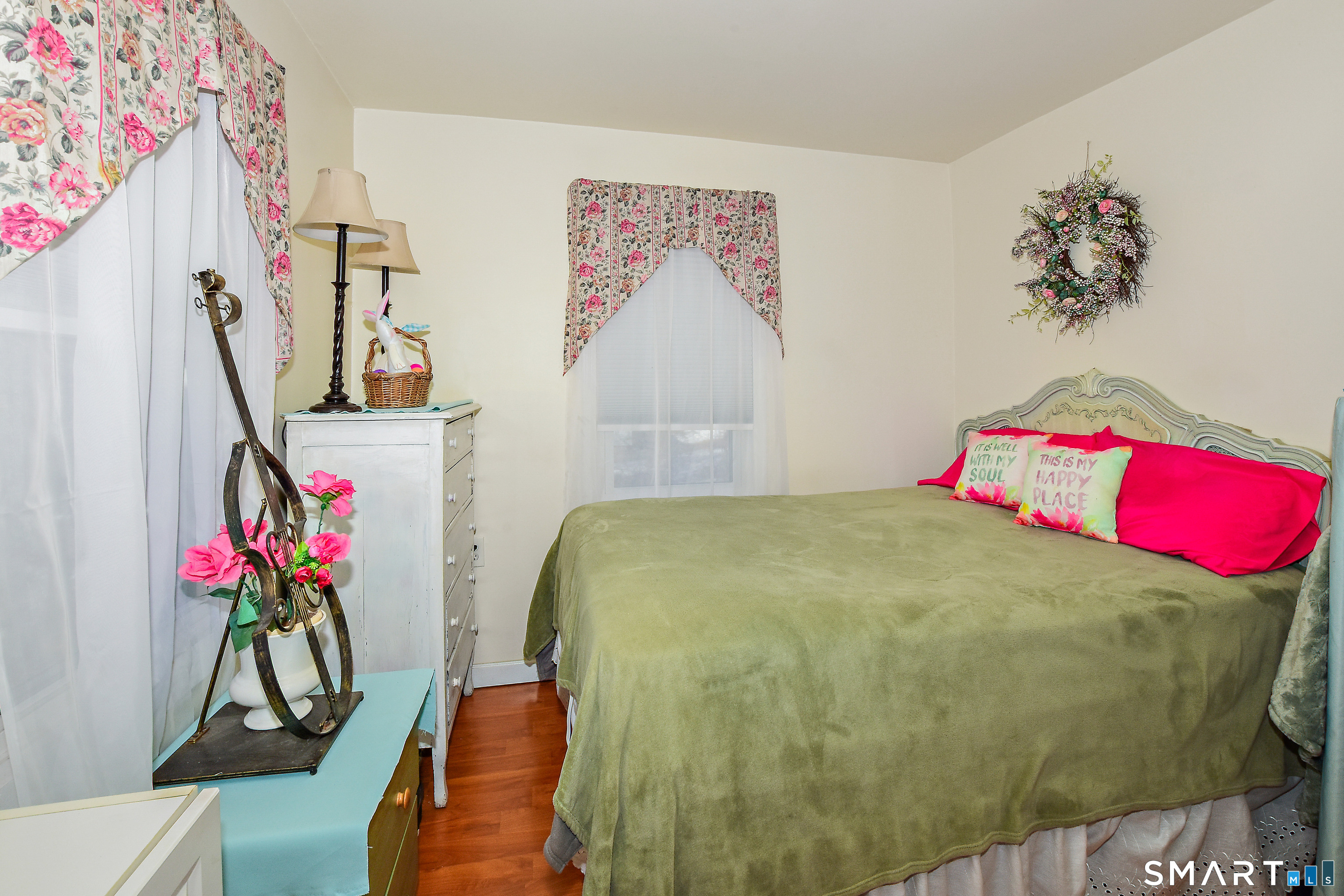 23 Victoria Street Griswold, CT 06351 - Photo 14 of 23 a bed room with a bed and a painting on the wall