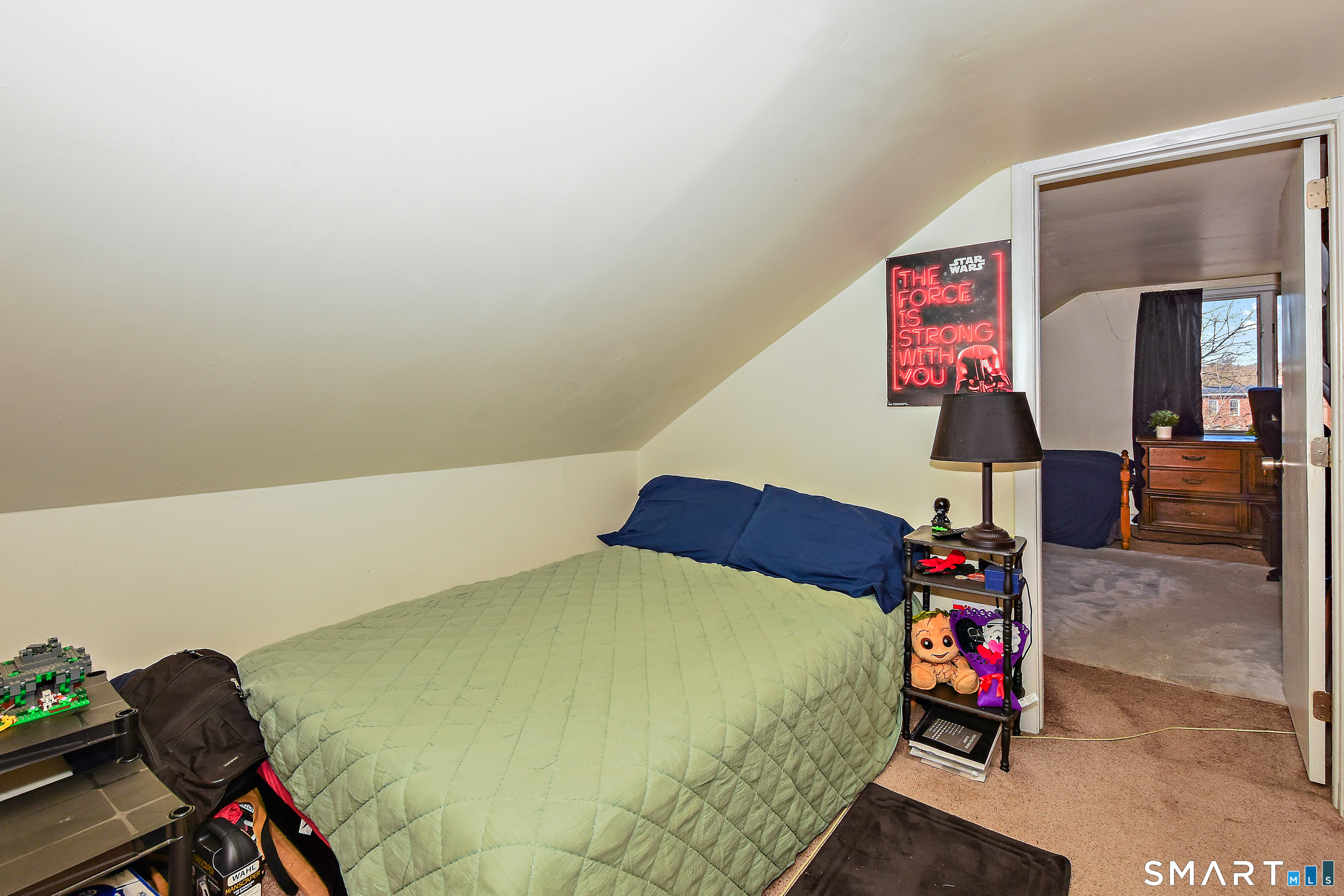 23 Victoria Street Griswold, CT 06351 - Photo 17 of 23 a bedroom with a bed and furniture