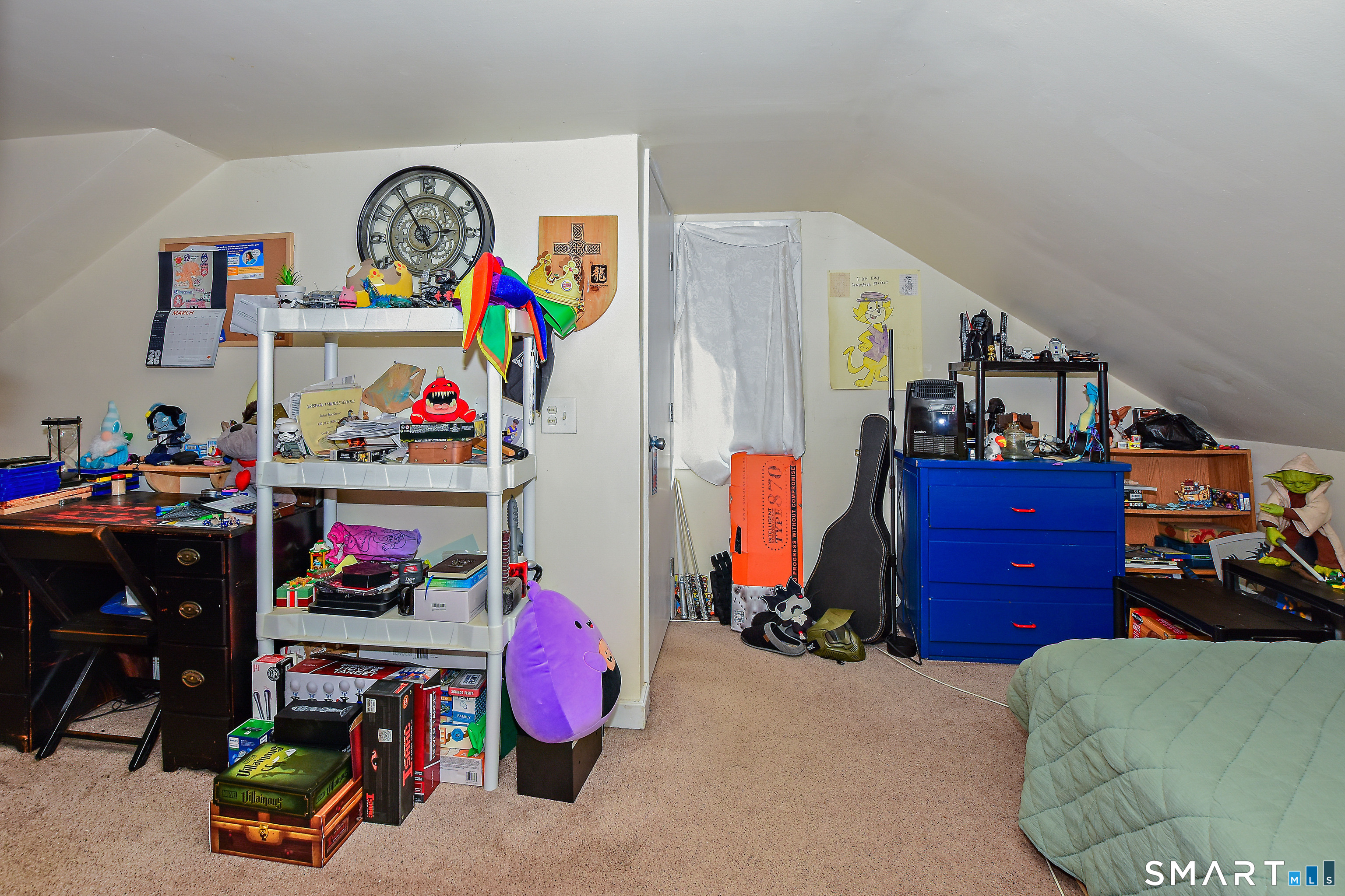 23 Victoria Street Griswold, CT 06351 - Photo 18 of 23 a bedroom with a bed a books and dresser