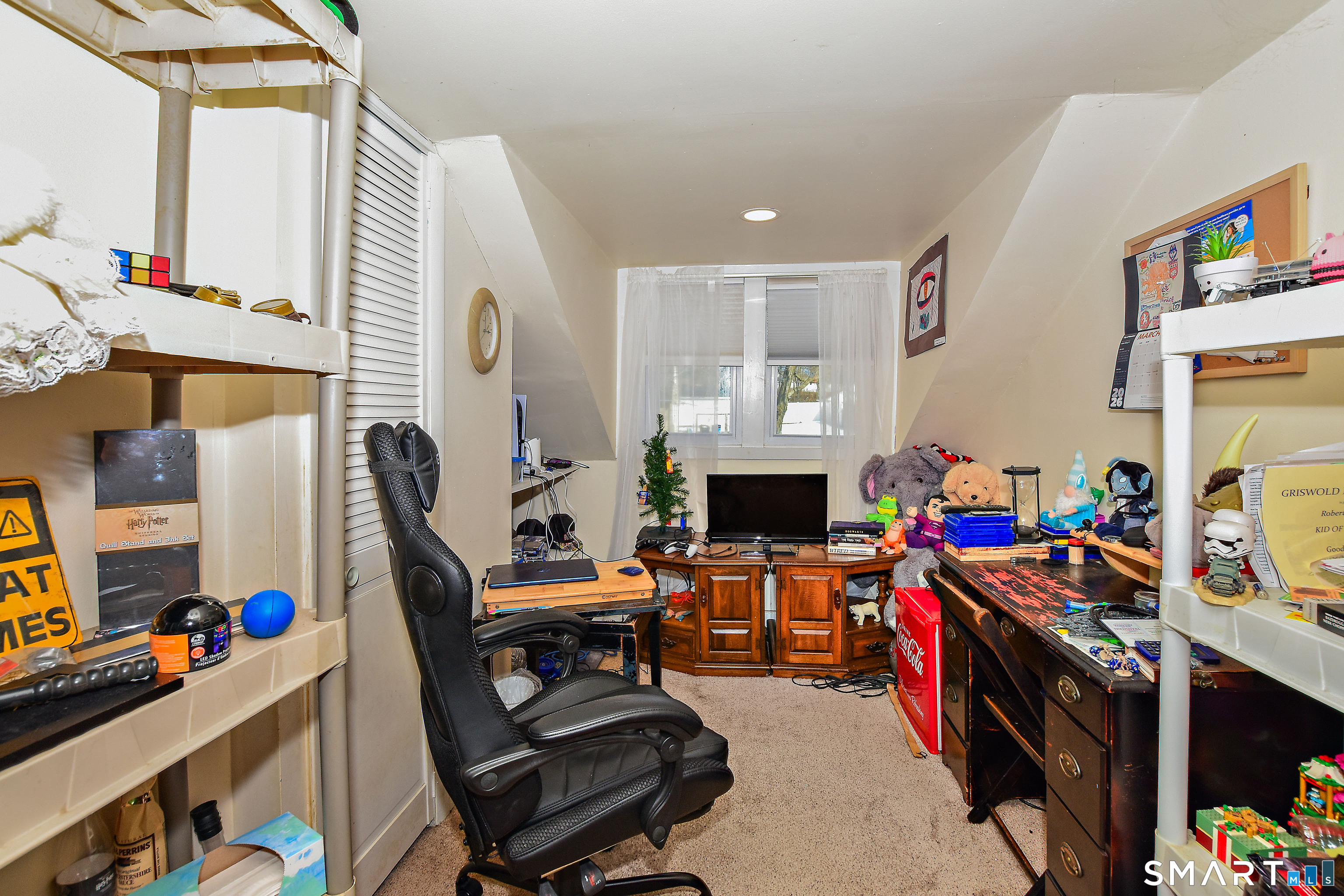 23 Victoria Street Griswold, CT 06351 - Photo 19 of 23 a view of a room with workspace and music instruments