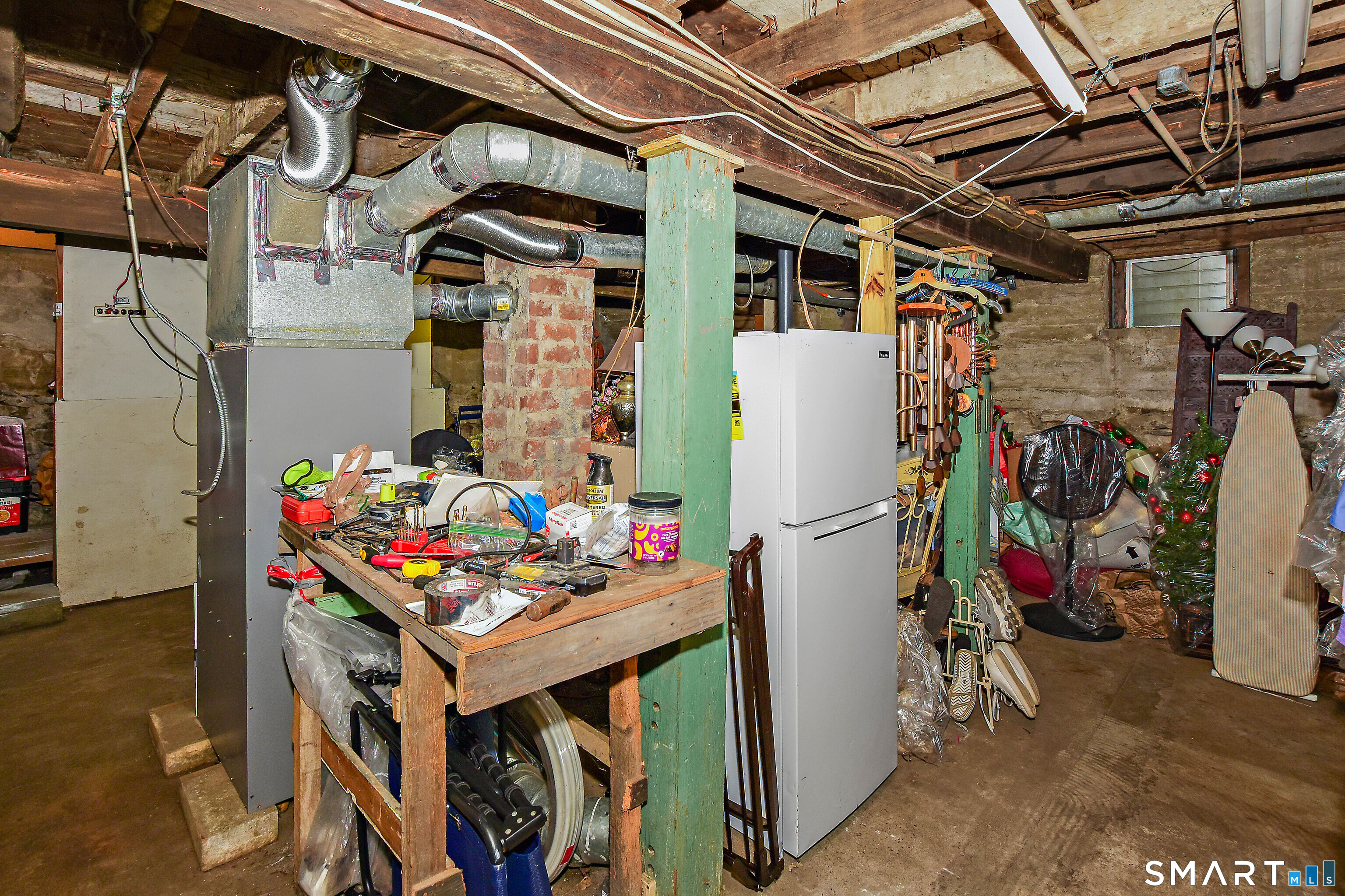 23 Victoria Street Griswold, CT 06351 - Photo 23 of 23 a view of walk in closet with clothes and shoes