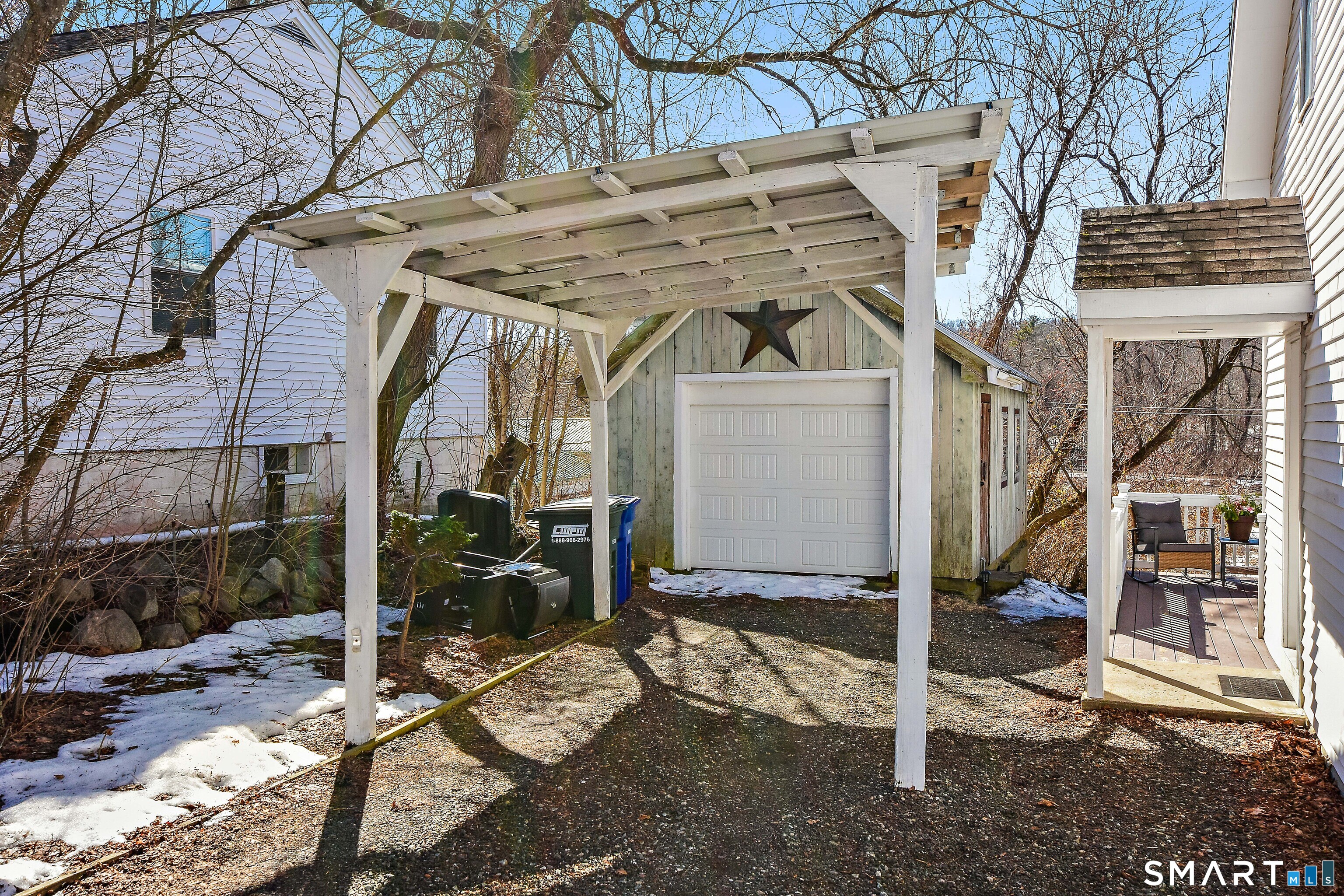 23 Victoria Street Griswold, CT 06351 - Photo 5 of 23 a view of a house with a wooden fence