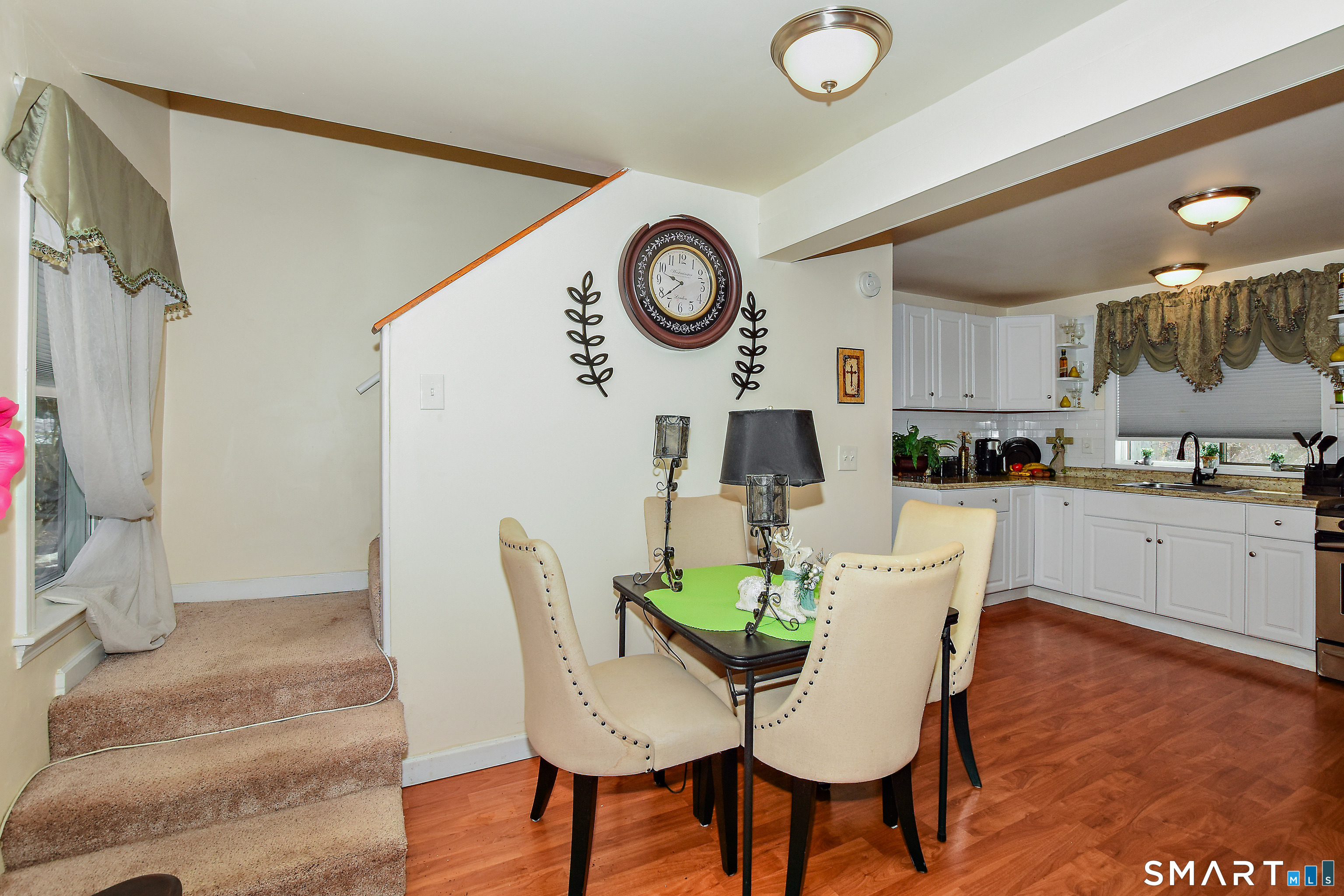 23 Victoria Street Griswold, CT 06351 - Photo 10 of 23 a living room with furniture and a wooden floor
